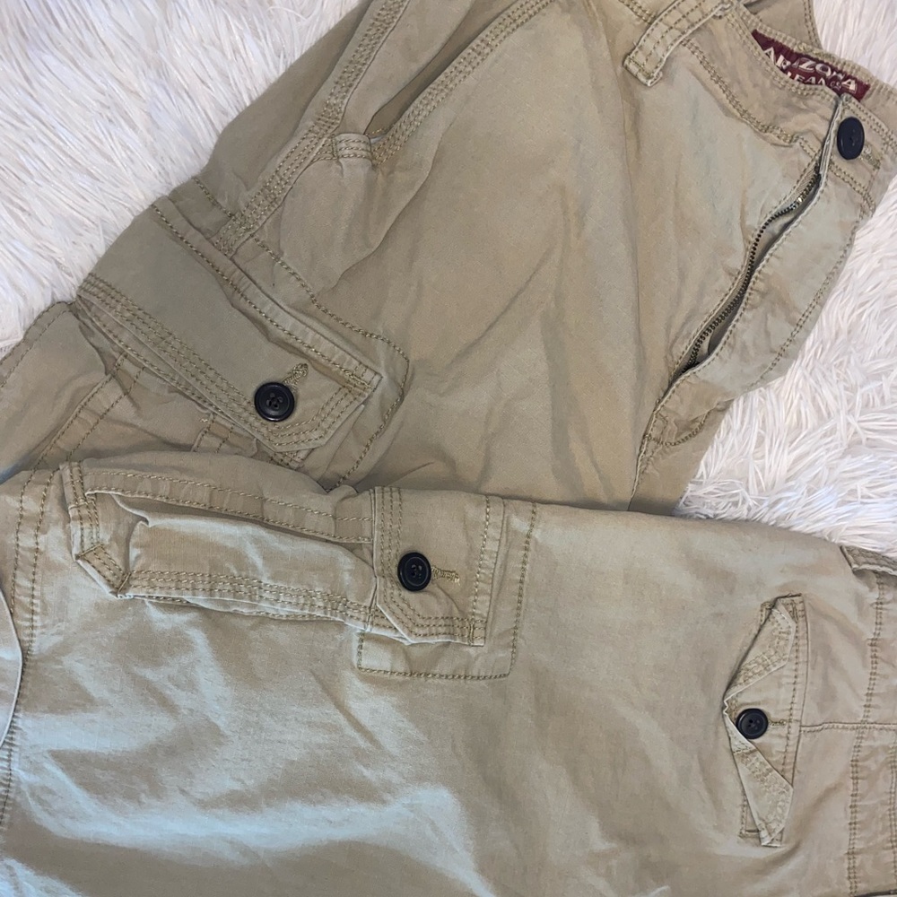 $10 each!! Never worn without tags tan cargo shorts. Size 34 mens